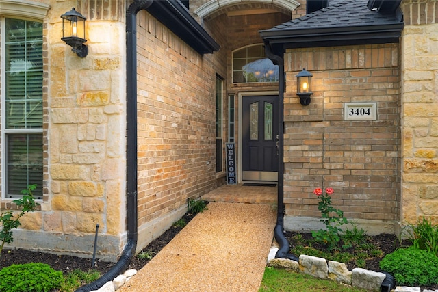 3404 Brookshire Run, Corinth, TX 76210 - entrance to property with a shingled roof and brick siding
