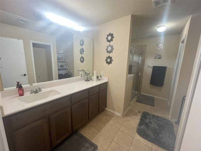 306 Valley Lake Ct, Springtown, TX 76082 - full bathroom with tile patterned floors, vanity, and a stall shower