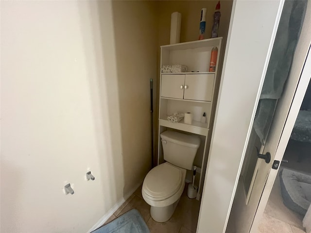 306 Valley Lake Ct, Springtown, TX 76082 - bathroom with toilet and tile patterned floors