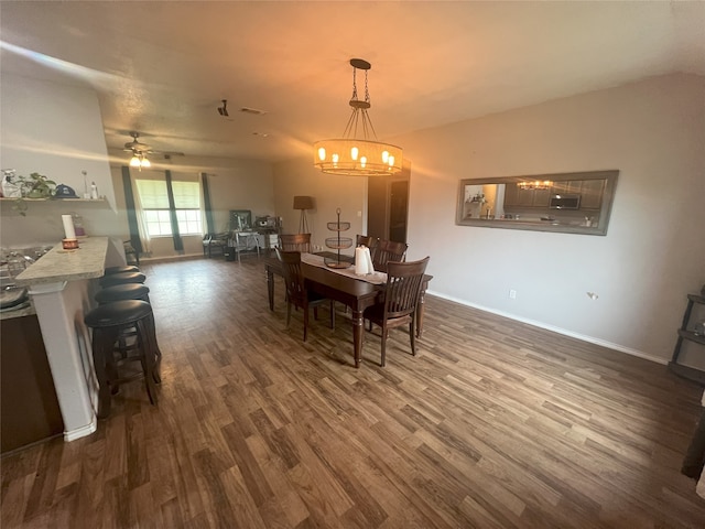 306 Valley Lake Ct, Springtown, TX 76082 - dining space featuring dark wood-type flooring, a chandelier, baseboards, and ceiling fan