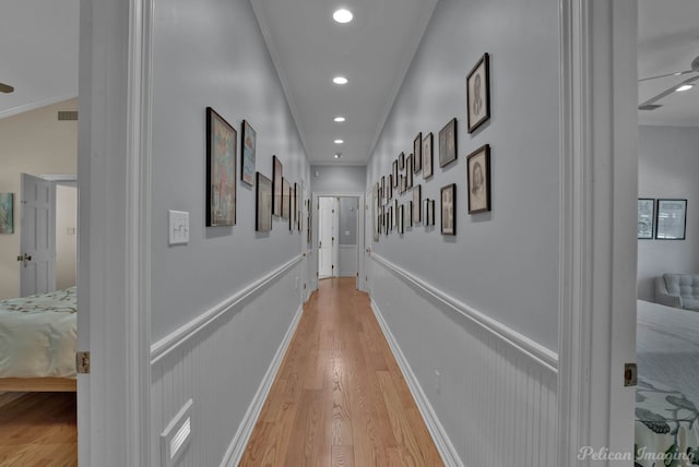 6706 Querbes Dr, Shreveport, LA 71106 - corridor featuring crown molding, light wood-style floors, wainscoting, and recessed lighting