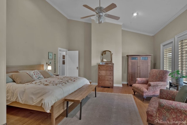 6706 Querbes Dr, Shreveport, LA 71106 - bedroom featuring wood finished floors, crown molding, high vaulted ceiling, baseboards, and ceiling fan