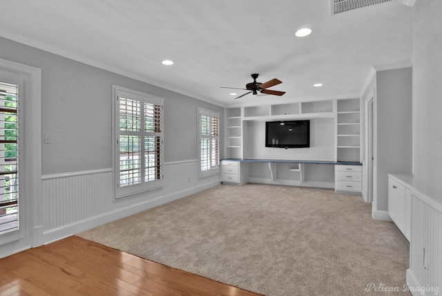 6706 Querbes Dr, Shreveport, LA 71106 - unfurnished living room featuring plenty of natural light, a ceiling fan, recessed lighting, wainscoting, and wood finished floors