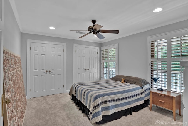 6706 Querbes Dr, Shreveport, LA 71106 - bedroom featuring two closets, carpet, crown molding, recessed lighting, and a ceiling fan