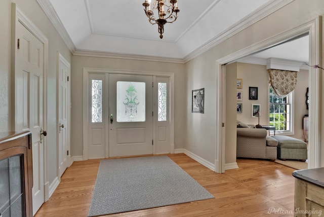 6706 Querbes Dr, Shreveport, LA 71106 - foyer with light wood-style floors, baseboards, a chandelier, and a tray ceiling
