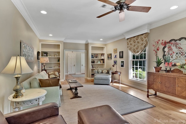 6706 Querbes Dr, Shreveport, LA 71106 - living room with built in shelves, recessed lighting, ceiling fan, ornamental molding, and baseboards