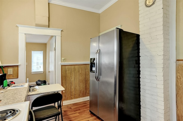225 N Binkley St, Sherman, TX 75092 - kitchen with stainless steel fridge, light countertops, light wood-style flooring, crown molding, and an office area