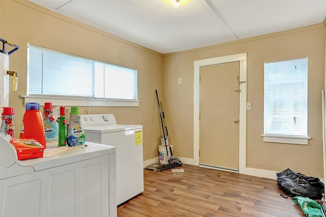 225 N Binkley St, Sherman, TX 75092 - washroom with washing machine and dryer, light wood-style floors, and baseboards