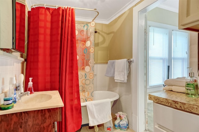 225 N Binkley St, Sherman, TX 75092 - bathroom featuring tile walls, a tub, ornamental molding, a shower with shower curtain, and vanity