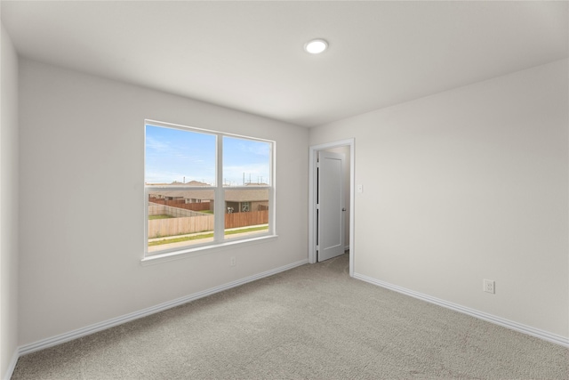 120 Doma Ave, Greenville, TX 75402 - carpeted spare room featuring baseboards