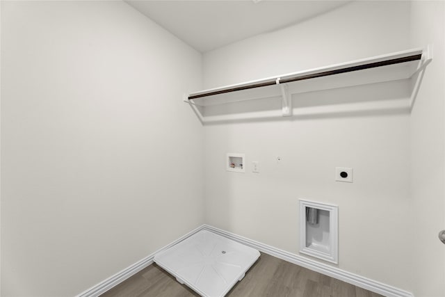 120 Doma Ave, Greenville, TX 75402 - washroom with electric dryer hookup, washer hookup, hookup for a gas dryer, and wood finished floors