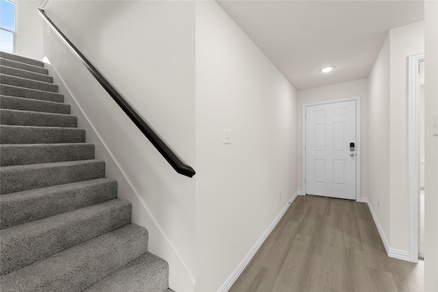 120 Doma Ave, Greenville, TX 75402 - stairway with wood finished floors and recessed lighting