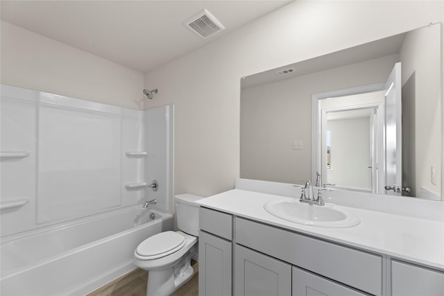 120 Doma Ave, Greenville, TX 75402 - bathroom featuring vanity, bathtub / shower combination, and wood finished floors