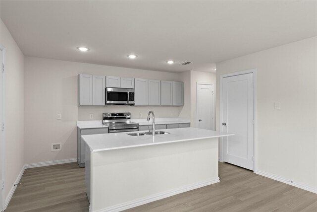 120 Doma Ave, Greenville, TX 75402 - living area with light wood-style flooring and baseboards