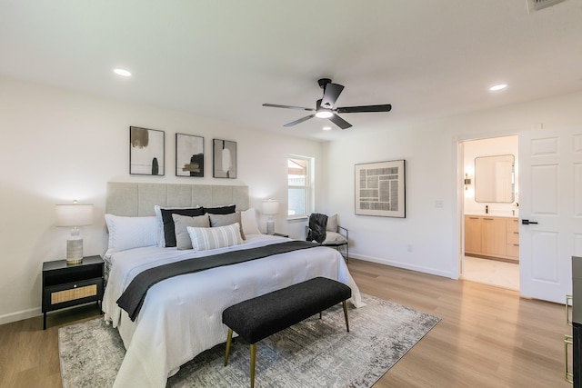 2505 Kelsey Dr, Plano, TX 75075 - bedroom with light wood-style flooring, baseboards, recessed lighting, ensuite bathroom, and ceiling fan