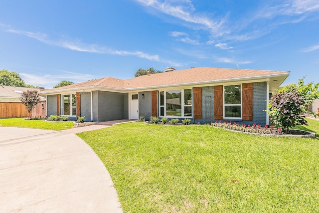 2505 Kelsey Dr, Plano, TX 75075 - single story home featuring brick siding, driveway, and an attached garage