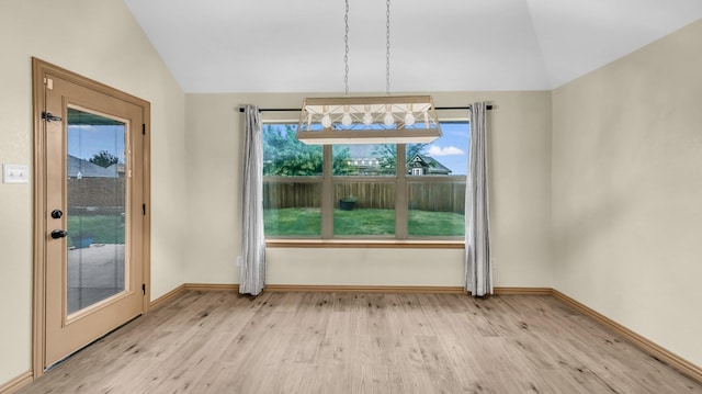 110 Emilie Ct, Weatherford, TX 76087 - unfurnished dining area featuring lofted ceiling, light wood-style flooring, and baseboards