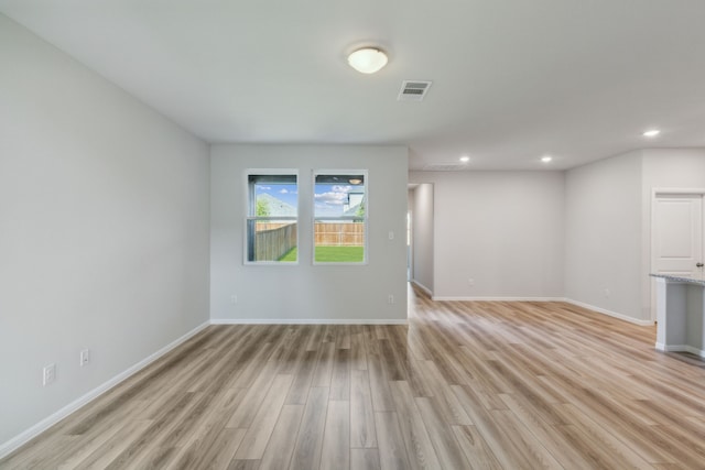 3010 Isla Ter, Princeton, TX 75407 - unfurnished room featuring light wood finished floors, recessed lighting, and baseboards