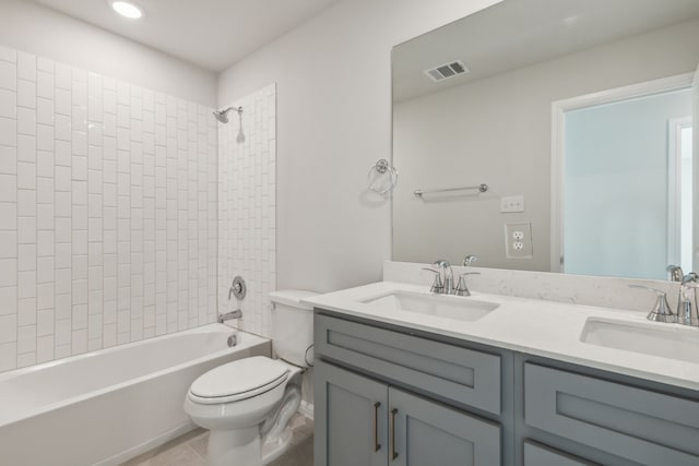3010 Isla Ter, Princeton, TX 75407 - bathroom featuring toilet, tile patterned floors, shower / bathtub combination, double vanity, and recessed lighting