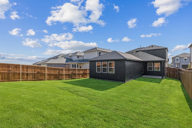 3010 Isla Ter, Princeton, TX 75407 - back of property featuring a shingled roof