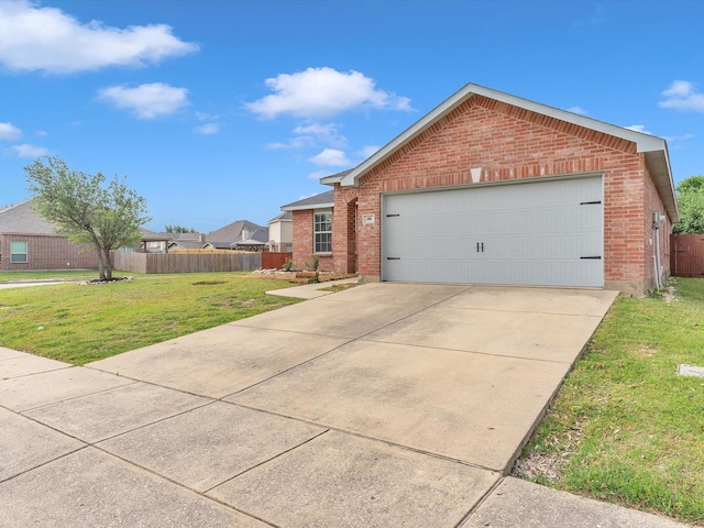 401 Iron Ore Trl, Fort Worth, TX 76131 - view of front of home with brick siding, driveway, and a garage