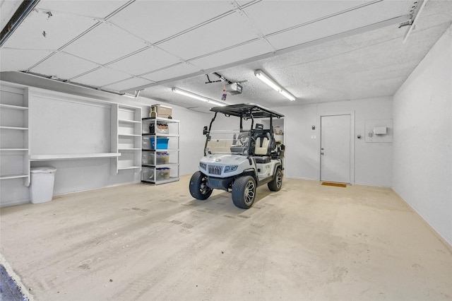 912 Kiowa Dr W, Lake Kiowa, TX 76240 - garage with a garage door opener