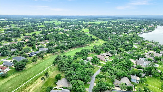 912 Kiowa Dr W, Lake Kiowa, TX 76240 - aerial view of property and surrounding area with a large body of water and nearby suburban area