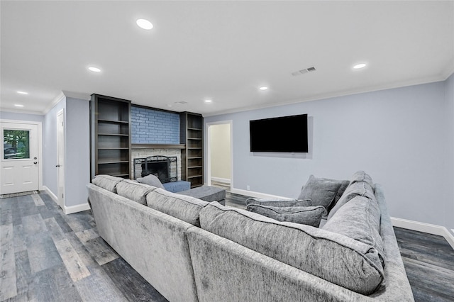 912 Kiowa Dr W, Lake Kiowa, TX 76240 - living room with baseboards, crown molding, a fireplace, recessed lighting, and dark wood finished floors