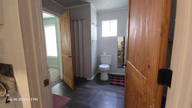 8278 Circle Dr, Kemp, TX 75143 - bathroom featuring crown molding and wood finished floors