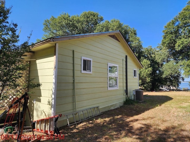 8278 Circle Dr, Kemp, TX 75143 - view of home's exterior with a central air condition unit and a lawn