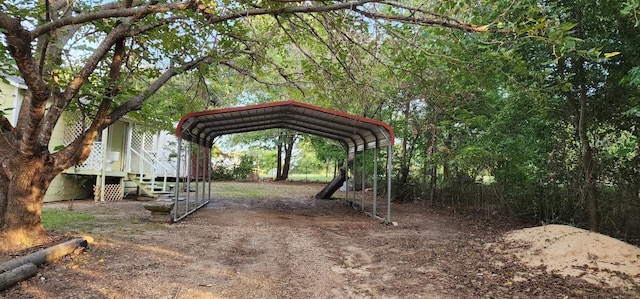 8278 Circle Dr, Kemp, TX 75143 - view of yard featuring a carport and dirt driveway