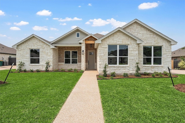 313 Crye Cir, Robinson, TX 76706 - view of front of house with a front yard and stone siding