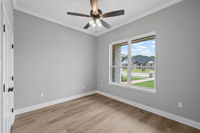 313 Crye Cir, Robinson, TX 76706 - spare room featuring light wood finished floors, baseboards, a ceiling fan, and crown molding