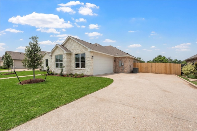 313 Crye Cir, Robinson, TX 76706 - ranch-style house featuring stone siding, driveway, an attached garage, and cooling unit