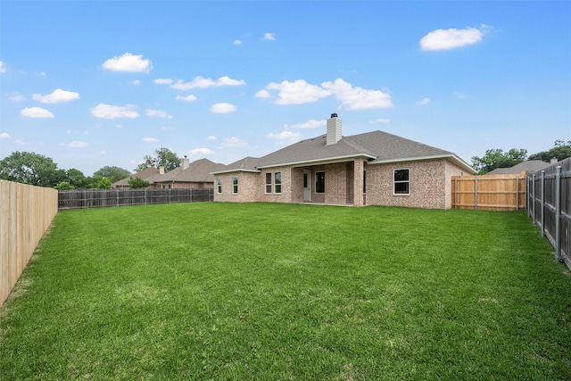 313 Crye Cir, Robinson, TX 76706 - back of house with a chimney