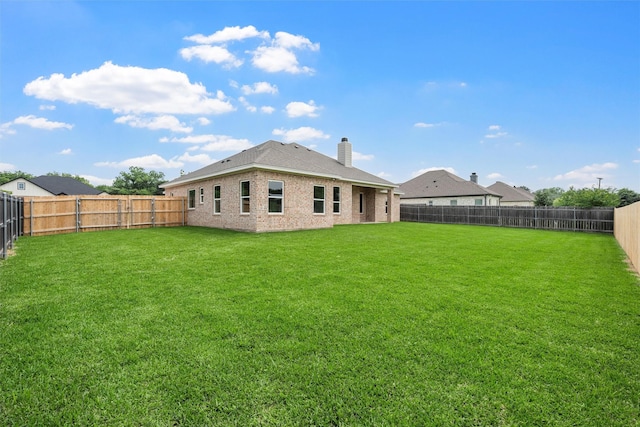 313 Crye Cir, Robinson, TX 76706 - back of house featuring a chimney and brick siding