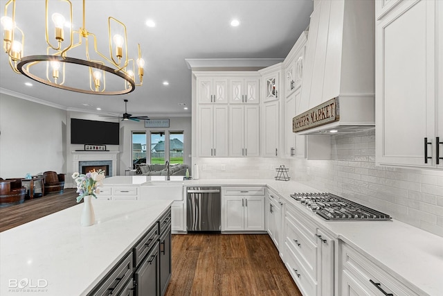 267 Poydras Ave, Bossier City, LA 71111 - kitchen featuring stainless steel appliances, a ceiling fan, open floor plan, custom range hood, and white cabinets