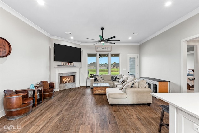 267 Poydras Ave, Bossier City, LA 71111 - living room with ceiling fan, dark wood-style flooring, recessed lighting, a fireplace, and crown molding