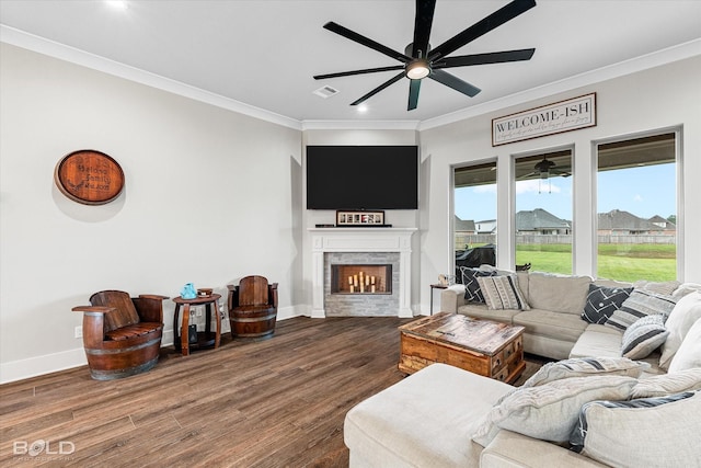 267 Poydras Ave, Bossier City, LA 71111 - living area with a ceiling fan, crown molding, wood finished floors, a stone fireplace, and recessed lighting