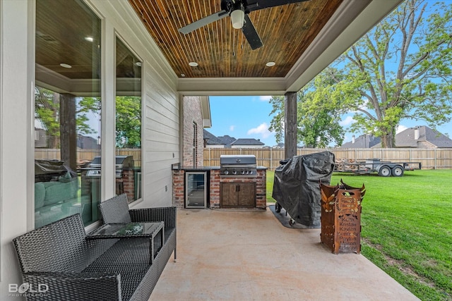 267 Poydras Ave, Bossier City, LA 71111 - view of patio / terrace with area for grilling, wine cooler, a ceiling fan, and a grill