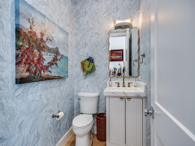 5019 Lark Ln, Dallas, TX 75209 - bathroom featuring vanity and wallpapered walls