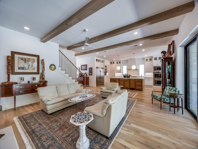 5019 Lark Ln, Dallas, TX 75209 - living area with light wood-style floors, stairway, ceiling fan, beam ceiling, and recessed lighting