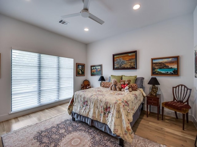 5019 Lark Ln, Dallas, TX 75209 - bedroom with recessed lighting, wood finished floors, and a ceiling fan