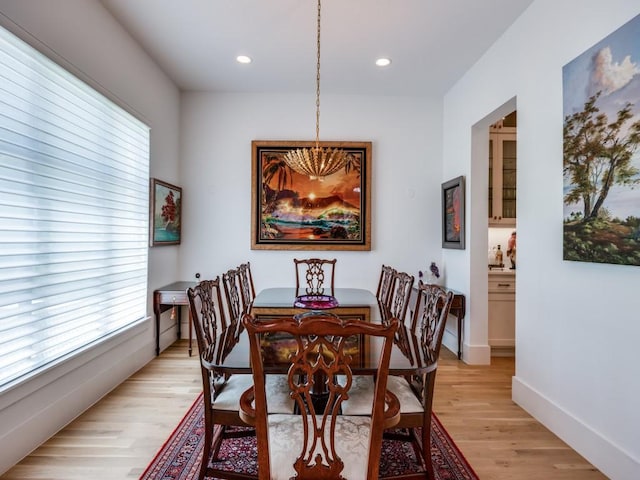 5019 Lark Ln, Dallas, TX 75209 - dining room featuring a chandelier, light wood-style flooring, plenty of natural light, and recessed lighting