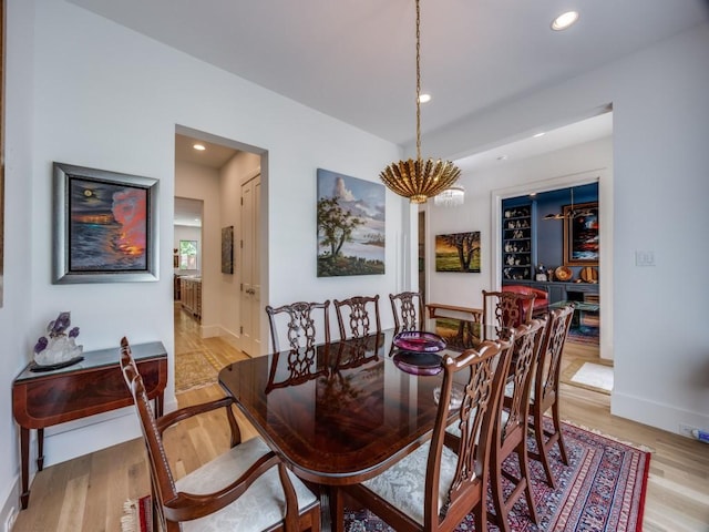 5019 Lark Ln, Dallas, TX 75209 - dining room with a chandelier, light wood-style flooring, and recessed lighting