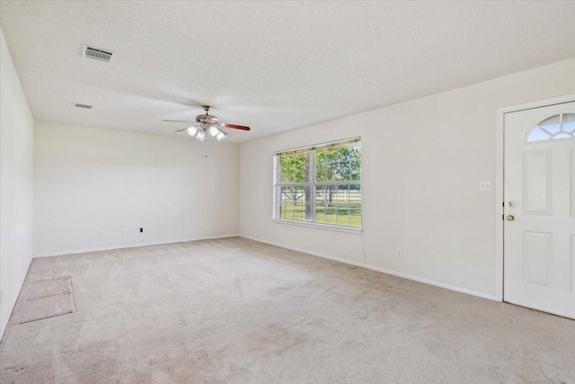 211 Partners Rd, Woodway, TX 76712 - carpeted spare room with a ceiling fan, baseboards, and a textured ceiling