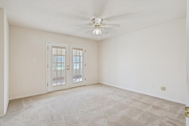 211 Partners Rd, Woodway, TX 76712 - unfurnished room with french doors, a ceiling fan, carpet, a textured ceiling, and baseboards