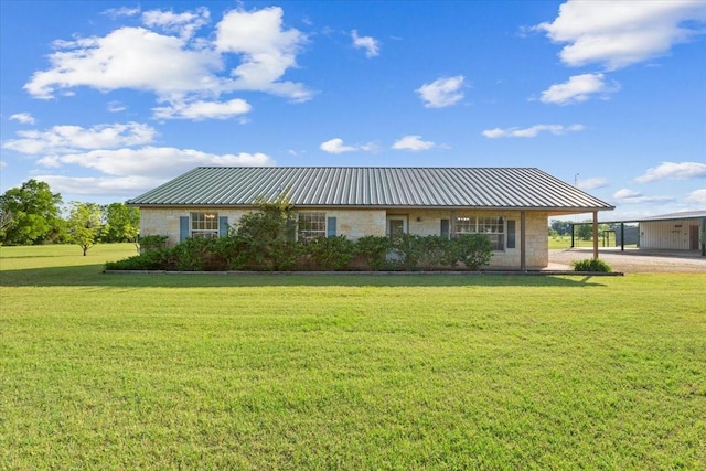 211 Partners Rd, Woodway, TX 76712 - view of front of house featuring metal roof, a front lawn, a carport, and stone siding