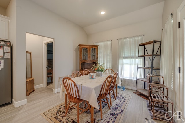 6833 Inverness St, Abilene, TX 79606 - dining space with vaulted ceiling, light wood-style floors, baseboards, and recessed lighting