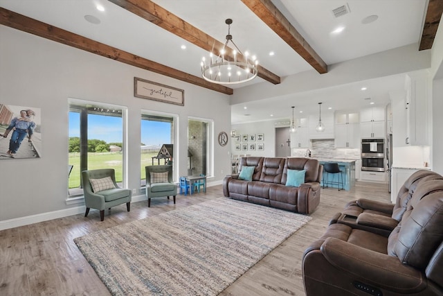 7747 Barber Ranch Rd, Fort Worth, TX 76126 - living area with a chandelier, baseboards, light wood finished floors, recessed lighting, and beamed ceiling